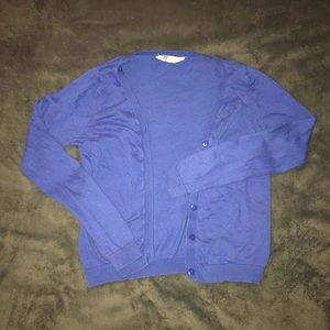 Blue cardigan.